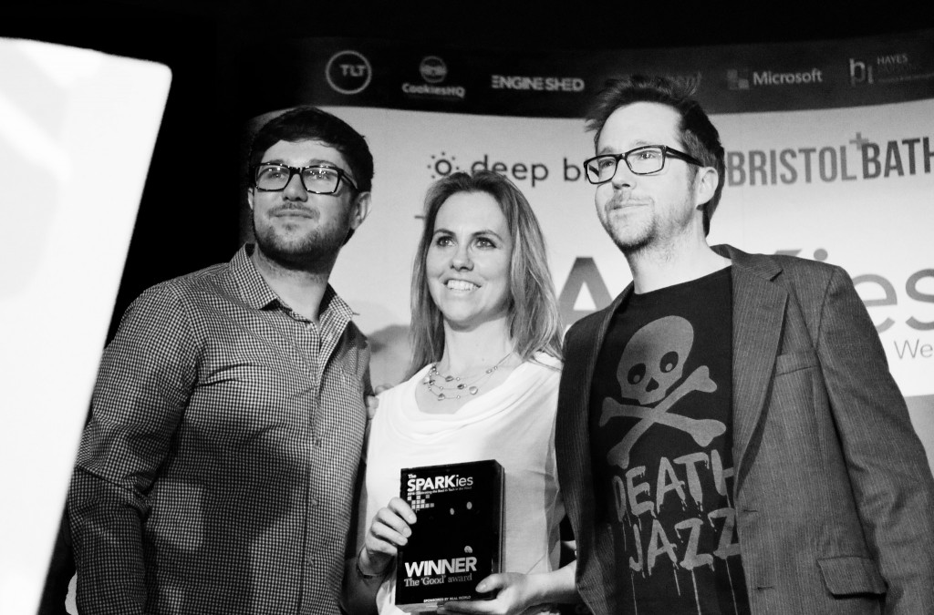 OLIO Co-Founder Tessa accepting her award with Simpleweb's Tom and Nick